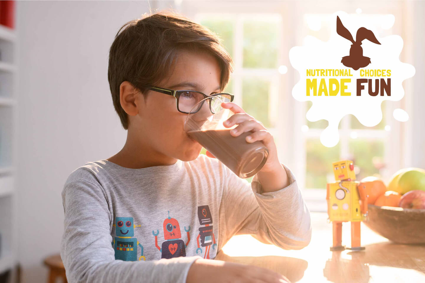 Young boy drinking a glass of Nesquik Young boy drinking a glass of Nesquik